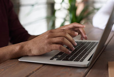 Person Using Macbook 1